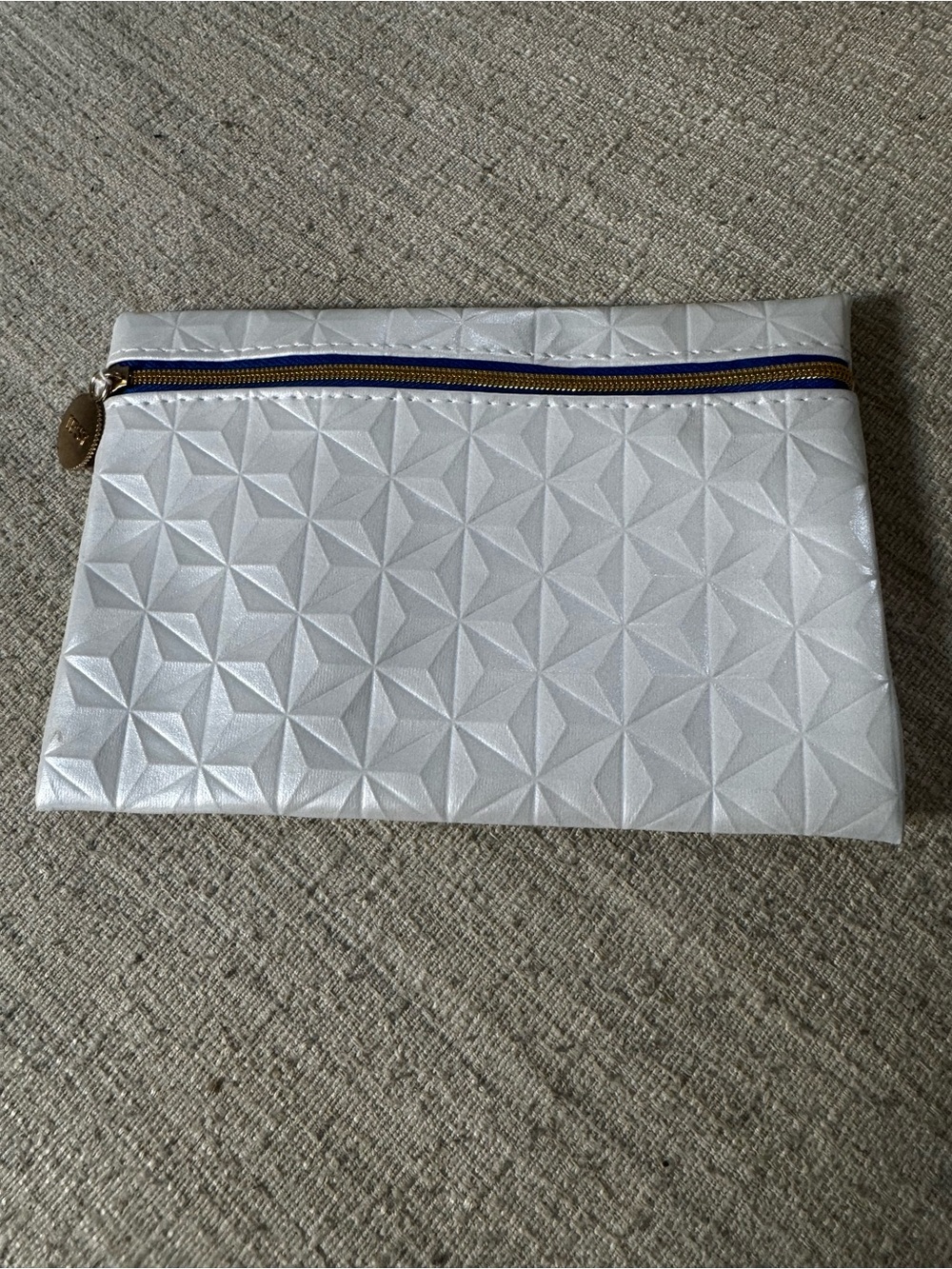 Geometric Embossed Metallic Pouch with Navy Zipper